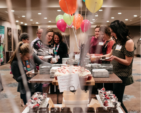 Guests help themselves to food at a Girls on the Run celebration
